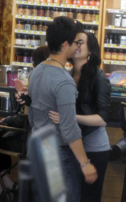 Demi Lovato and Joe Jonas showing there love for eachother in Hollywood