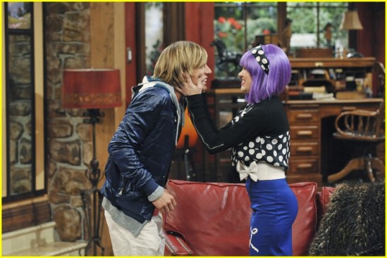 Emily Osment gives Cody Linley's cheeks a little squeeze in this new still